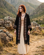 Model wearing kimono standing near boulder in desert landscape