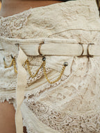 Desert Dori Mini Skirt with Metallic Chain Detail